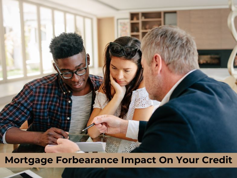 A couple is talking with a mortgage agent about mortgage forbearance that may affect their credit and financial status in the future.